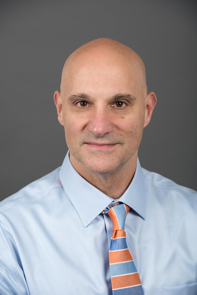 Dr. Mark I. Neuman